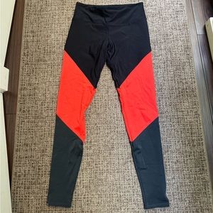 Onzie small/medium orange and dark navy leggings